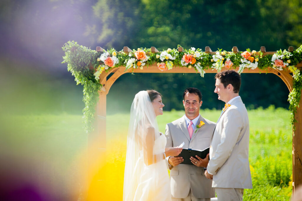 A joyful wedding ceremony moment at Top Notch Resort in Stowe, Vermont.